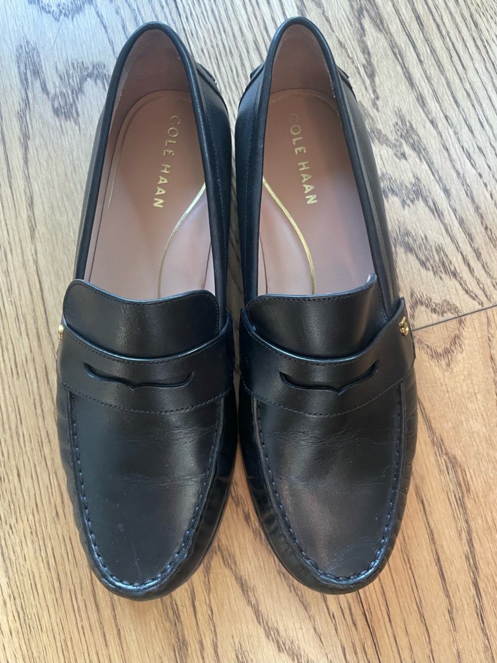 Cole Haan Black Leather Penny Loafers with Gold Accent